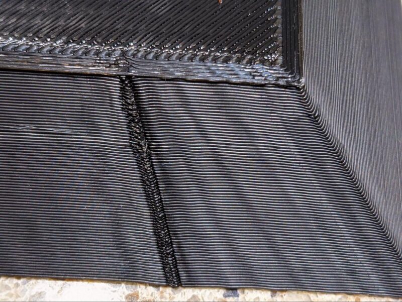 A close-up of an aligned Z-seam in 3D printing.