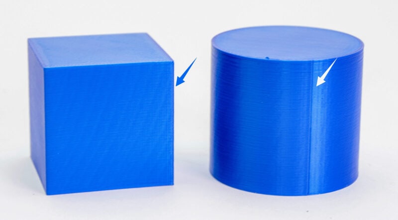 An example of how to hide the Z-seam on a 3D printed cube with a sharp corner, compared to a cylinder.
