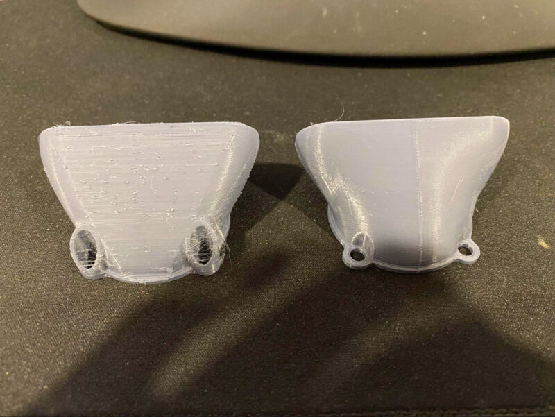Two 3D prints that show how changing the Z-seam alignment can fix and hide ugly blobs.