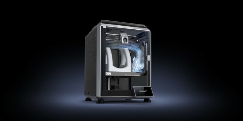 The Creality K1C fast 3D printer on a black background.