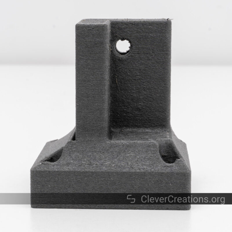 A 3D printed structural part made with PA12-CF filament.