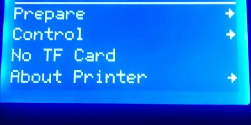 The Ender 3 No TF Card error message visible on the 3D printer LCD screen.