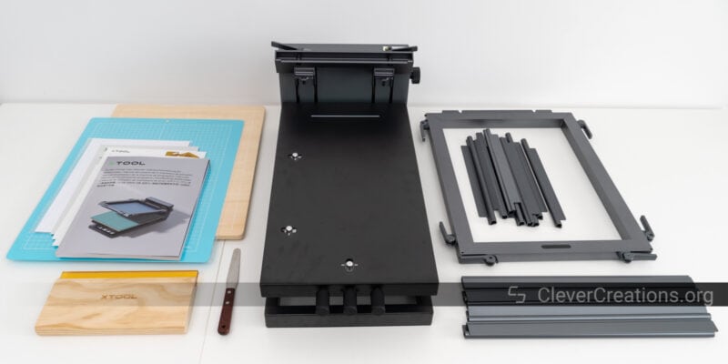 The xTool Screen Printer with frames, documentation, and tools.